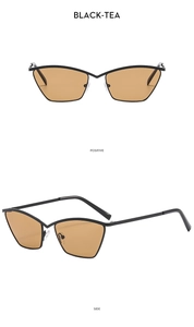 Detail view showing front and side profile of cat-eye metal sunglasses with brown lenses