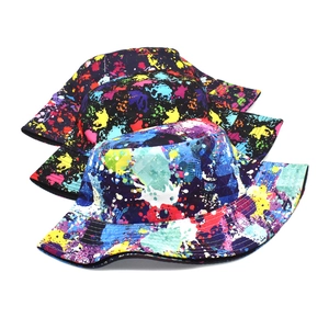 Three tie-dye graffiti bucket hats for men and women featuring colorful spray paint patterns