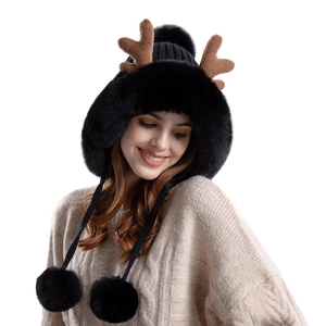 Winter plush trapper hat with brown antlers and black pom-poms for cold weather protection