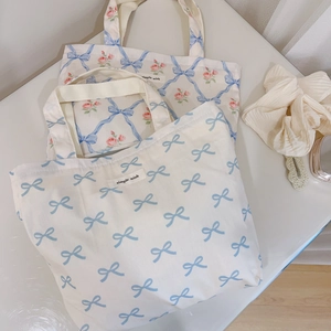 Floral canvas tote bag set with blue bows and pink roses with a simple wish label