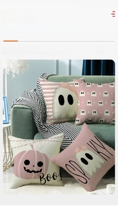 Close-up of four Halloween pillows with ghost prints and PP cotton filling details