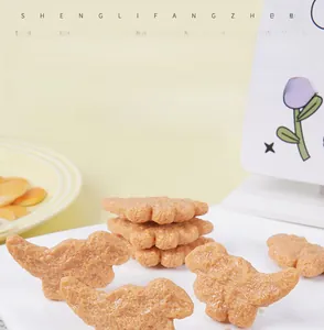 Gros plan détaillé de modèles de nuggets de dinosaures à la texture dorée croustillante