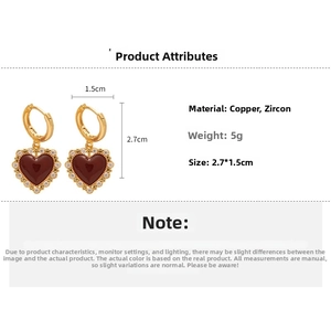 Detailed view of vintage Ancora red heart earrings with zircon and gold plating, 2.7x1.5cm size