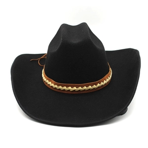 Detail of a black wool felt cowboy hat featuring a braided ethnic style brown band