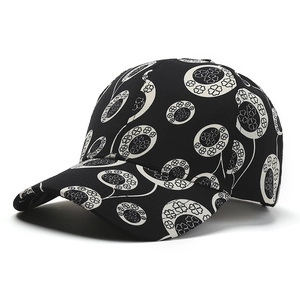 Classic black baseball cap with white clover ring prints and curved brim in cotton