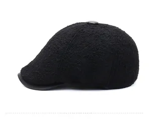 Side view of black winter flat cap featuring thick textured wool-like warm fabric