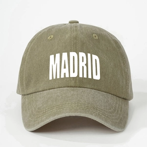 Adjustable washed cotton baseball cap in olive green with white MADRID print