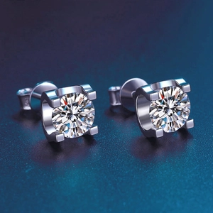 Macro shot of D-color round moissanite earrings with 925 silver four-claw setting