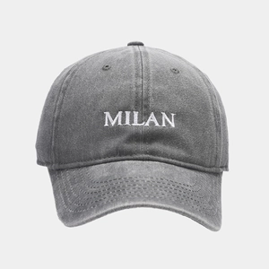 Front detail of MILAN embroidery on washed grey cotton vintage baseball cap