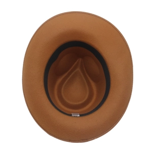 Macro view of the internal sweatband and tag inside a brown wool felt fedora hat