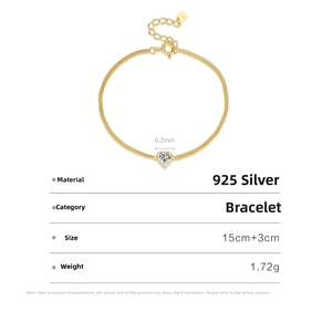 Detailed close-up of S925 sterling silver gold heart bracelet with clear stone charm