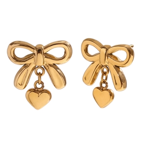 Elegant 18K gold plated bow earrings with heart-shaped pendants on a white background