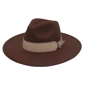 Detail view of the wide brim fedora with a beige leather strap and silver buckle