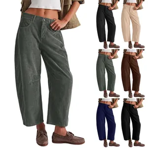Detail view of high-waisted corduroy wide-leg trousers in multiple color options