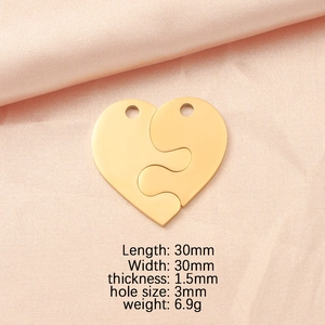 Polished gold heart puzzle pendant with size specs: 30mm x 30mm, weight 6.9g