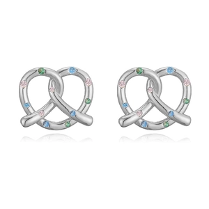 Detailed view of silver pretzel earrings with multi-colored crystals on white background