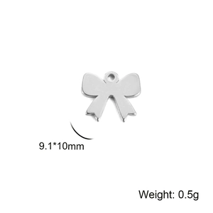 Detailed view of a silver titanium steel bow charm pendant measuring 9.1x10mm