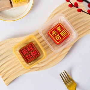 Thickened food-grade PP square mooncake trays in white and gold with elegant patterns