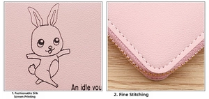 Detail of pink faux leather wallet with cute rabbit print and neat white stitching
