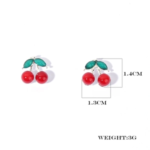 Detail view of cherry earrings with 1.4cm height and 1.3cm width measurements
