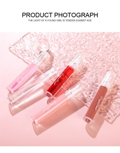 Glossy mirror water lip glaze set featuring 5 vibrant shades on a water-textured surface