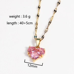 Detail of pink heart zircon pendant on golden titanium steel chain with size info