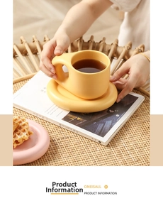 Detailed view of yellow ceramic chubby mug set with saucer and pink dessert plate