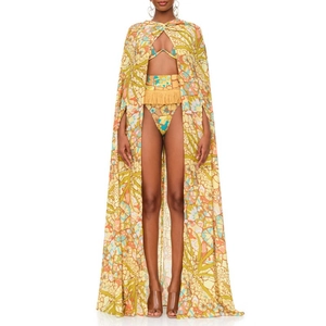 Three-piece bohemian bikini set with ethnic print shawl and decorative fringes
