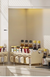 Two-tier cream kitchen spice rack featuring five transparent drawers and upper storage