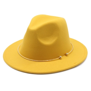 Detail of bright yellow felt fedora featuring a minimalist gold beaded band decoration
