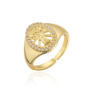 Detailed macro view of the gold religious Virgin Mary ring with crystal halo setting