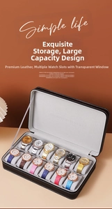 Detail of 12-slot leather watch box with soft grey lining and clear display window