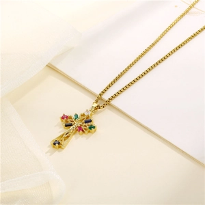 Gold cross pendant necklace with colorful cubic zirconia stones in hip hop style