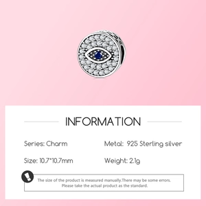 Macro detail of S925 sterling silver evil eye charm with blue zircon, 10.7mm size