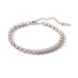 Detail of 18K gold-plated stainless steel bicolor leaf link bracelet with extender