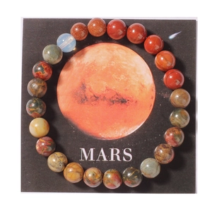 Detail of Mars themed natural stone beaded bracelet with red tiger eye and opal on card