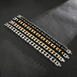 Detailed close-up of 11mm bike chain bracelets in silver, gold, and black steel