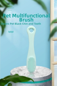 Macro detail of light green silicone pet brush for cleaning teeth and chin acne