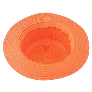 Detail view of bright orange straw sun hat with woven texture and matching inner sweatband