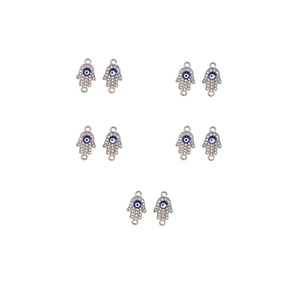 Macro shot of 10 silver Hamsa Hand pendants with blue evil eye and sparkling rhinestones