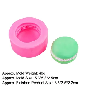 Silicone macaron mold showing dimensions 5.3x5.3x2.5cm and 40g weight for baking