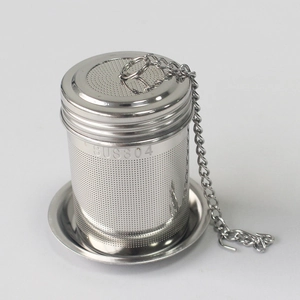 Detailed view of SUS304 stainless steel tea infuser with mesh filter, chain and base tray