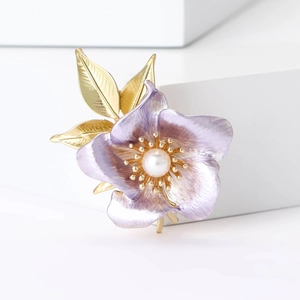 Elegant purple enamel daffodil flower brooch with gold edges and a center pearl detail