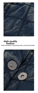 Close-up of diamond-quilted denim fabric texture and metallic magnetic button closure