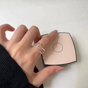 Minimalist 925 sterling silver liquid lava open ring shown on hand with high mirror shine