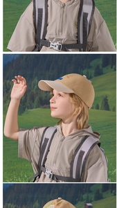 Detail of khaki kids baseball cap with blue embroidery and matching outdoor clothing