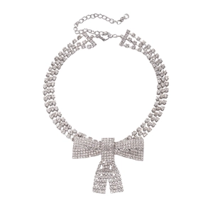 Sparkling silver bow choker with three rows of rhinestones and adjustable lobster clasp