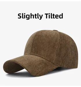 Detail of dark brown baseball cap featuring classic herringbone fabric texture and structure
