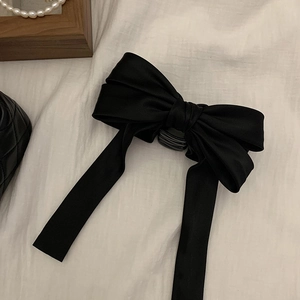 Elegant oversized black satin bow hair claw clip for women in a vintage french style