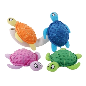 Plush turtle squeaky dog toy in vibrant colors for interactive pet play and chewing